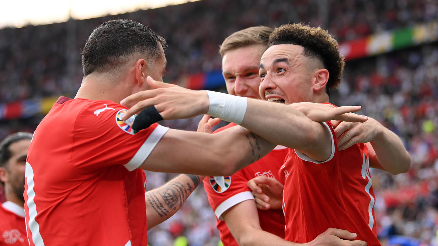 Switzerland celebrate their goal against Italy at EURO 2024