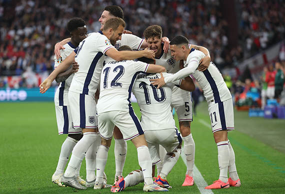England celebrate their opening goal against Serbia